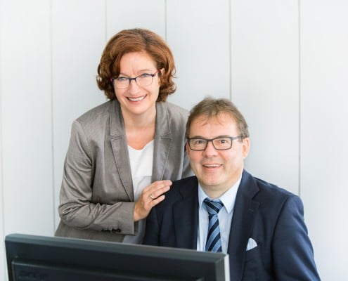Herr und Frau Pöhler im Büro